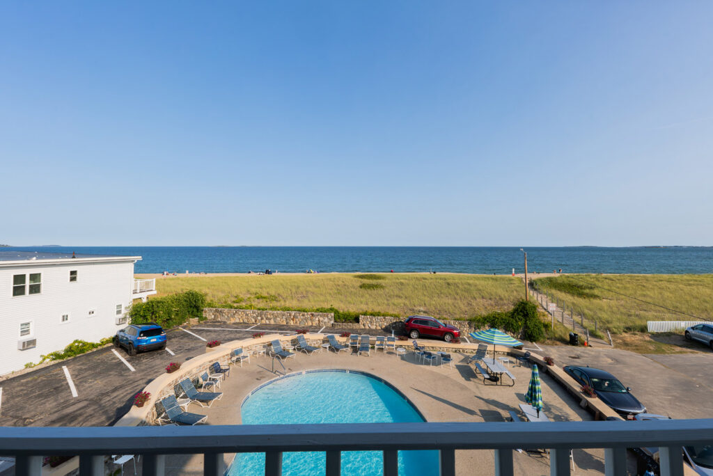 seaview two queen oceanfront room deck view of pool